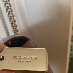 Small Coach purple bag with Suede Velvet on the inside.